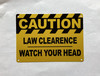 caution-law-clearence-watch-your-head-orange-building-safety-wall-plate.jpg