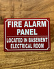 fire-alarm-panel-located-in-basement-electrical-room-aluminum-identification-sign.jpg