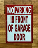 no-parking-in-front-of-garage-door-aluminum-identification-sign.jpg