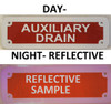 AUXILIARY DRAIN  Compliance sign