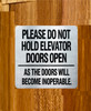 silver-please-do-not-hold-elevator-doors-open-as-the-doors-will-become-inoperable-building-notice.jpg