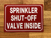sprinkler-shut-off-valve-inside-sign-red-equipment-notice.jpg