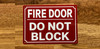 fire-door-do-not-block-sign-red-equipment-notice.jpg