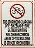 the-storing-or-charging-of-e-bikes-and-e-bikes-batteries-sign-5-x-7-inches-white-aluminum-sign.jpg