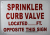 SPRINKLER CURB VALVE LOCATED_ FEET OPPOSITE THIS   BUILDING SIGNAGE