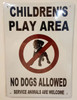 Building CHILDREN’S PLAY AREA - NO DOGS ALLOWED SERVICE ANIMALS ARE WELCOME - WHITE BACKGROUND  sign