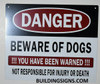 DANGER BEWARE OF DOGS YOU HAVE BEEN WARNED NOT RESPONSIBLE FOR INJURY OR DEATH   BUILDING SIGN