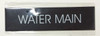 SIGN WATER MAIN  - BLACK