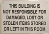 Compliance sign THIS BUILDING IS NOT RESPONSIBLE FOR DAMAGED, LOST OR STOLEN ITEMS STORED OR LEFT IN THIS ROOM