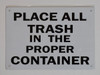 PLACE ALL TRASH IN THE PROPER CONTAINER  Building  sign