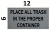 building sign PLACE ALL TRASH IN THE PROPER CONTAINER
