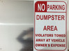 SIGN NO PARKING -DUMPSTER AREA - VIOLATORS TOWED AWAY AT VEHICLE OWNER'S EXPENSES