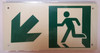 RUNNING MAN DOWN LEFT ARROW Sign - (Photoluminescent ,High Intensity