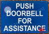 PUSH DOORBELL FOR ASSISTANCE SIGN