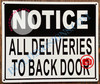 NOTICE ALL DELIVERIES TO BACK DOOR SIGN