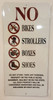 building sign NO BIKES, STROLLERS, BOXES AND SHOES IN PUBLIC AREAS - WHITE BACKGROUND (ALUMINUM S)