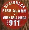 Sign Sprinkler fire Alarm When Bell Rings dial 911