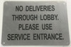 Compliance sign NO DELIVERIES THROUGH LOBBY PLEASE USE SERVICE ENTRANCE - WHITE BACKGROUND - The Mont Argent Line