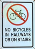 NO Bicycles in HALLWAYS OR ON STAIERS Signage