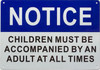 Notice children must with an adult SIGNAGE