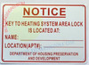 KEY TO HEATING SYSTEM AREA LOCK IS LOCATED AT SIGN