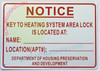 KEY TO HEATING SYSTEM AREA LOCK IS LOCATED AT SIGNAGE