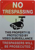 Signage NO TRESPASSING THIS PROPERTY IS PROTECTED BY VIDEO SURVEILLANCE