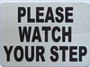 PLEASE WATCH YOUR STEP SIGN