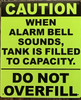 CAUTION WHEN ALARM BELL SOUNDS, TANK IS FILLED TO CAPACITY SIGN