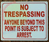 NO TRESPASSING ANYONE BEYOND THIS POINT SIGN