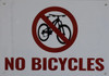 SIGNAGE NO BICYCLES - WHITE BACKGROUND RED LETTERS