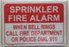 SPRINKLER FIRE ALARM WHEN BELL RINGS CALL FIRE DEPARTMENT OR POLICE-DIAL 911  BUILDING SIGN