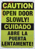 CAUTION: OPEN DOOR SLOWLY ENGLISH/SPANISH Signage
