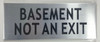 BASEMENT NOT AN EXIT SIGN