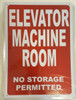 Compliance sign ELEVATOR MACHINE ROOM NO STORAGE PERMITTED - REFLECTIVE !!!