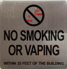 Signage  NO SMOKING OR VAPING WITHIN 25 FEET OF BUILDING