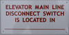 building sign ELEVATOR MAIN LINE DISCONNECT SWITCH IS LOCATED AT  (ALUMINUM S ) WHITE