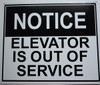 building sign NOTICE ELEVATOR IS OUT OF SERVICE
