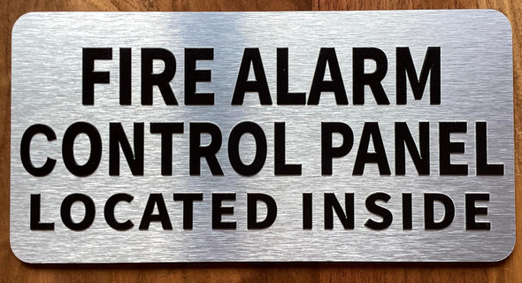 FD FIRE ALARM CONTROL PANEL LOCATED INSIDE SIGN WITH RAISED LETTERS/IMAGE NO BRAILLE