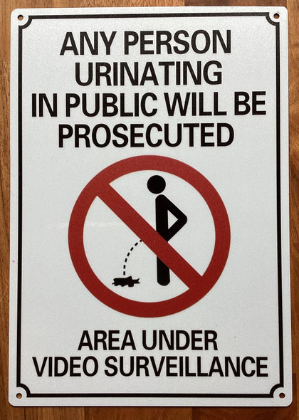 ANY PERSON URINATING IN PUBLIC WILL BE PROSECUTED -NO PUBLIC URINATION SIGN