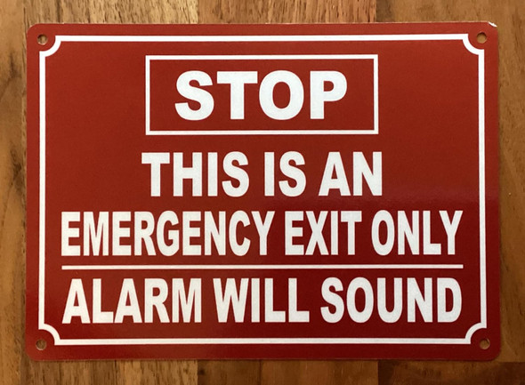 NYC STOP THIS IS AN EMERGENCY EXIT ONLY ALARM WILL SOUND SIGN