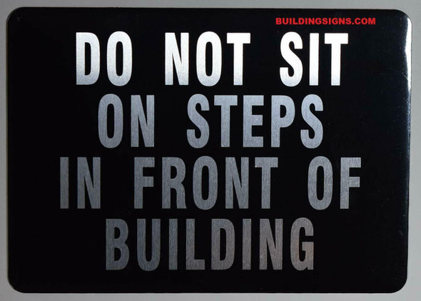 DO NOT SIT ON Steps in Front of Building Sign