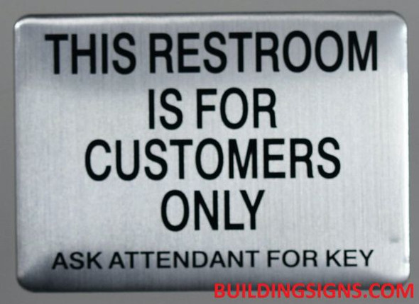 THIS RESTROOM IS FOR CUSTOMERS ONLY ASK ATTENDANT FOR KEY Sign