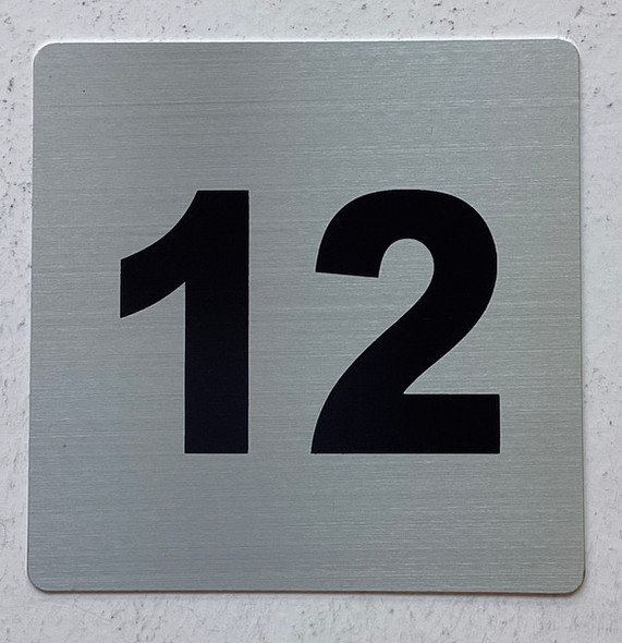 Apartment number 12 sign