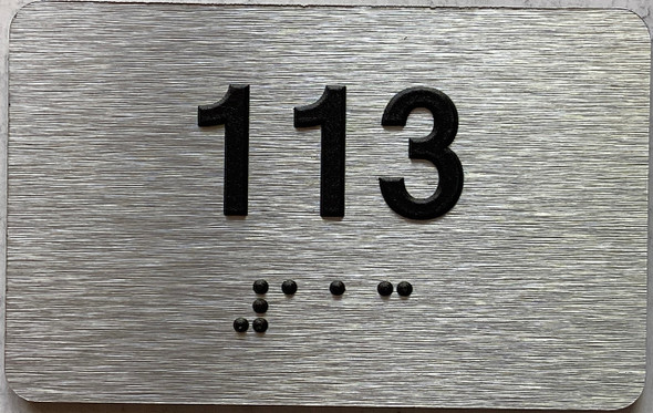 apartment number 113 sign