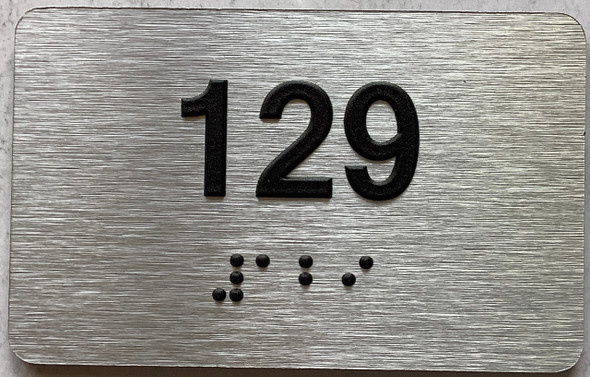 apartment number 129 sign