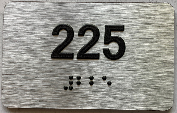 apartment number 225 sign