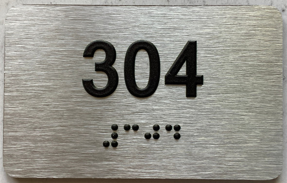 apartment number 304 sign