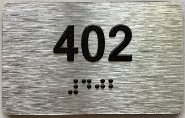 apartment number 402 sign