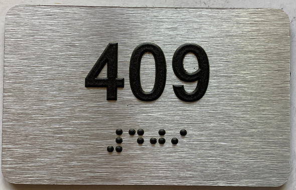 apartment number 409 sign